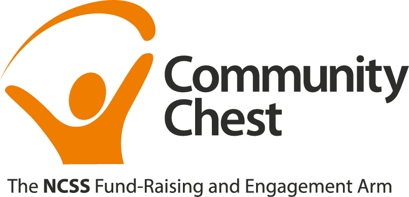 This logo of Community Chest features a vector upper torso of a person with both hands up in the air, and a curve connecting said said hands. Beside this are the words ‘Community Chest’ in dark grey sans-serif typeface.