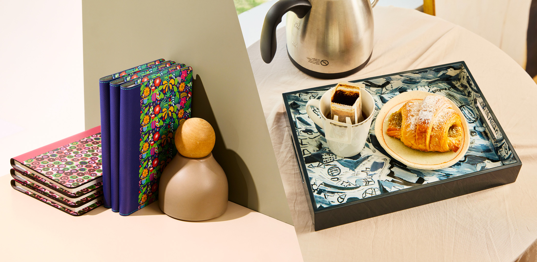 Image features notebooks and lacquerware trays with artworks by persons with disabilities.